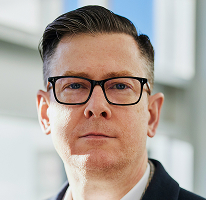 Ejecutivo de empresa de comercio cripto, Alexander Hughes, en retrato como CEO